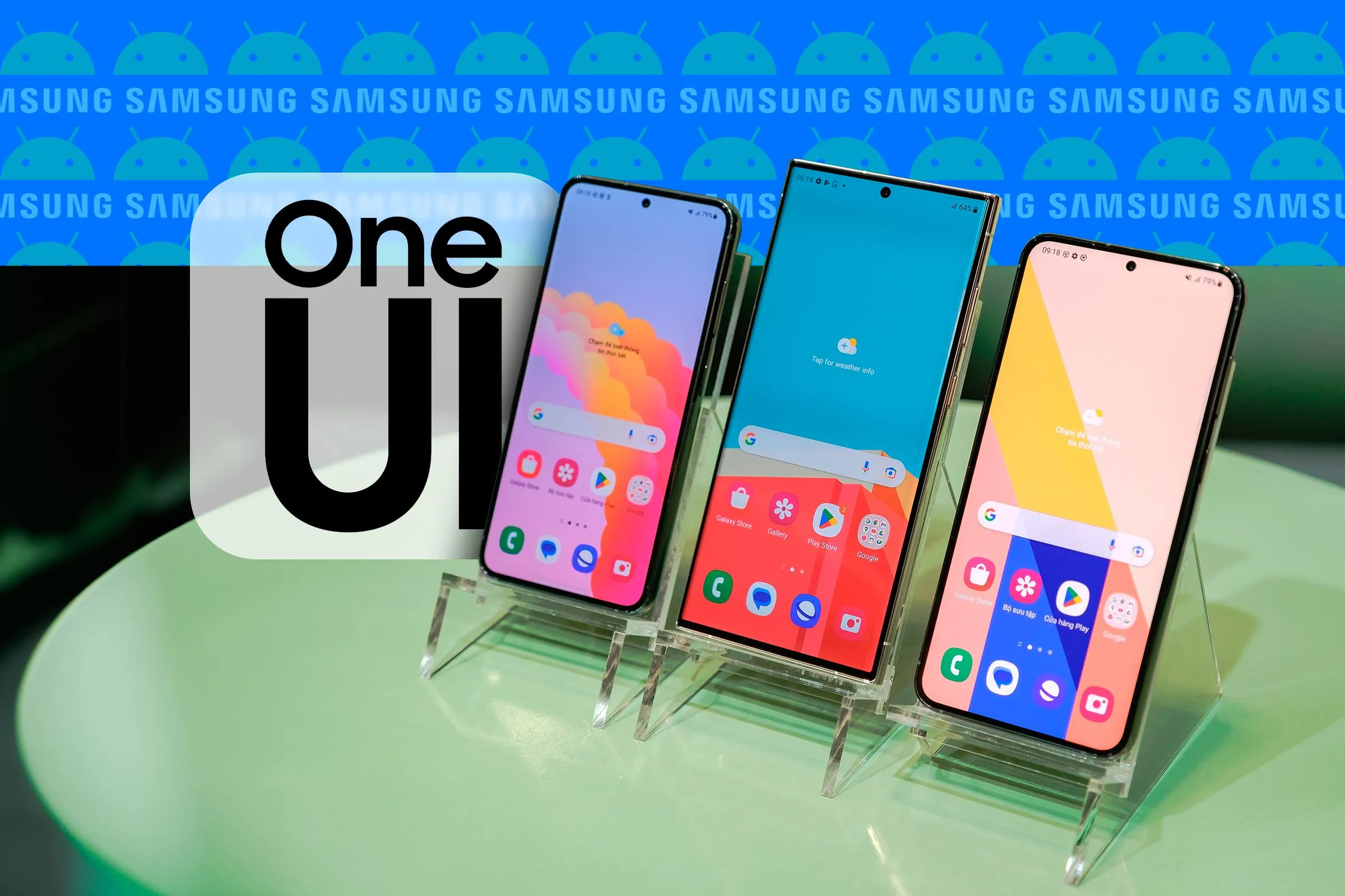Ba điện thoại Samsung Galaxy hiển thị giao diện One UI, cùng logo Samsung và Android