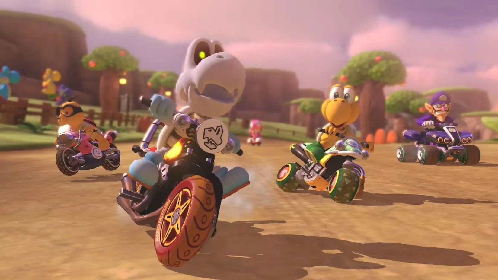 Các nhân vật Dry Bones và đồng đội đang đua trong Mario Kart 8 Deluxe, minh họa chế độ 200cc tốc độ cao và thử thách.