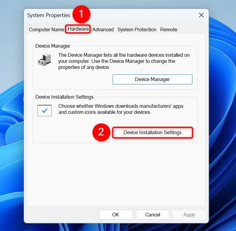 Cửa sổ System Properties, tab Hardware, chọn Device Installation Settings