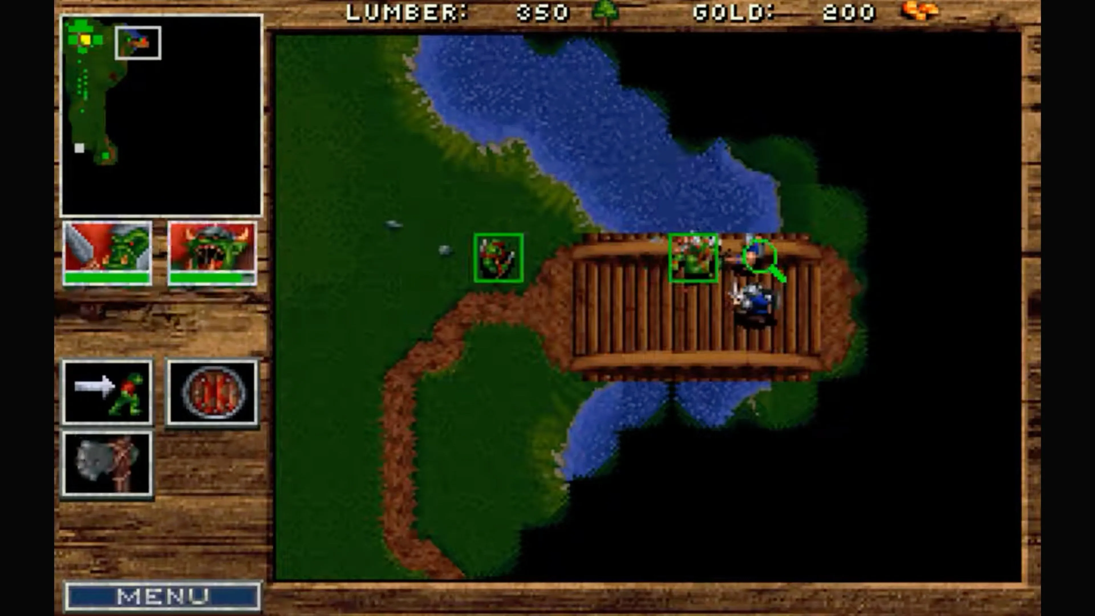 Giao diện xây dựng căn cứ của loài người trong Warcraft: Orcs &amp; Humans, hiển thị các công trình và đơn vị.