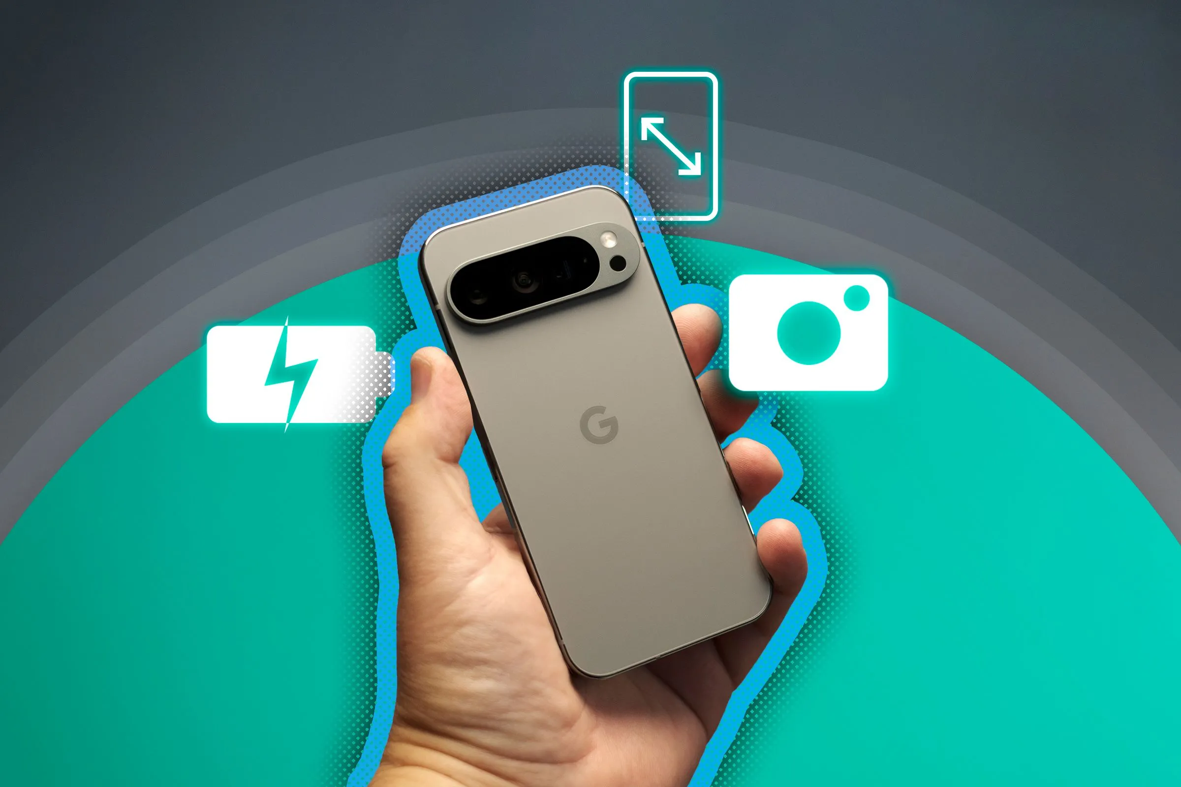 Một bàn tay cầm Google Pixel 9 Pro, làm nổi bật các tính năng về pin, camera và kích thước màn hình của điện thoại.