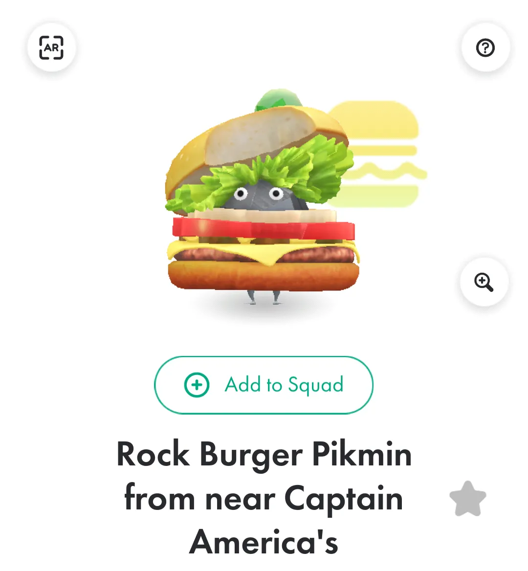 Một nhân vật Pikmin đội bộ trang phục bánh burger, nhìn ra từ giữa lớp rau diếp và cà chua.