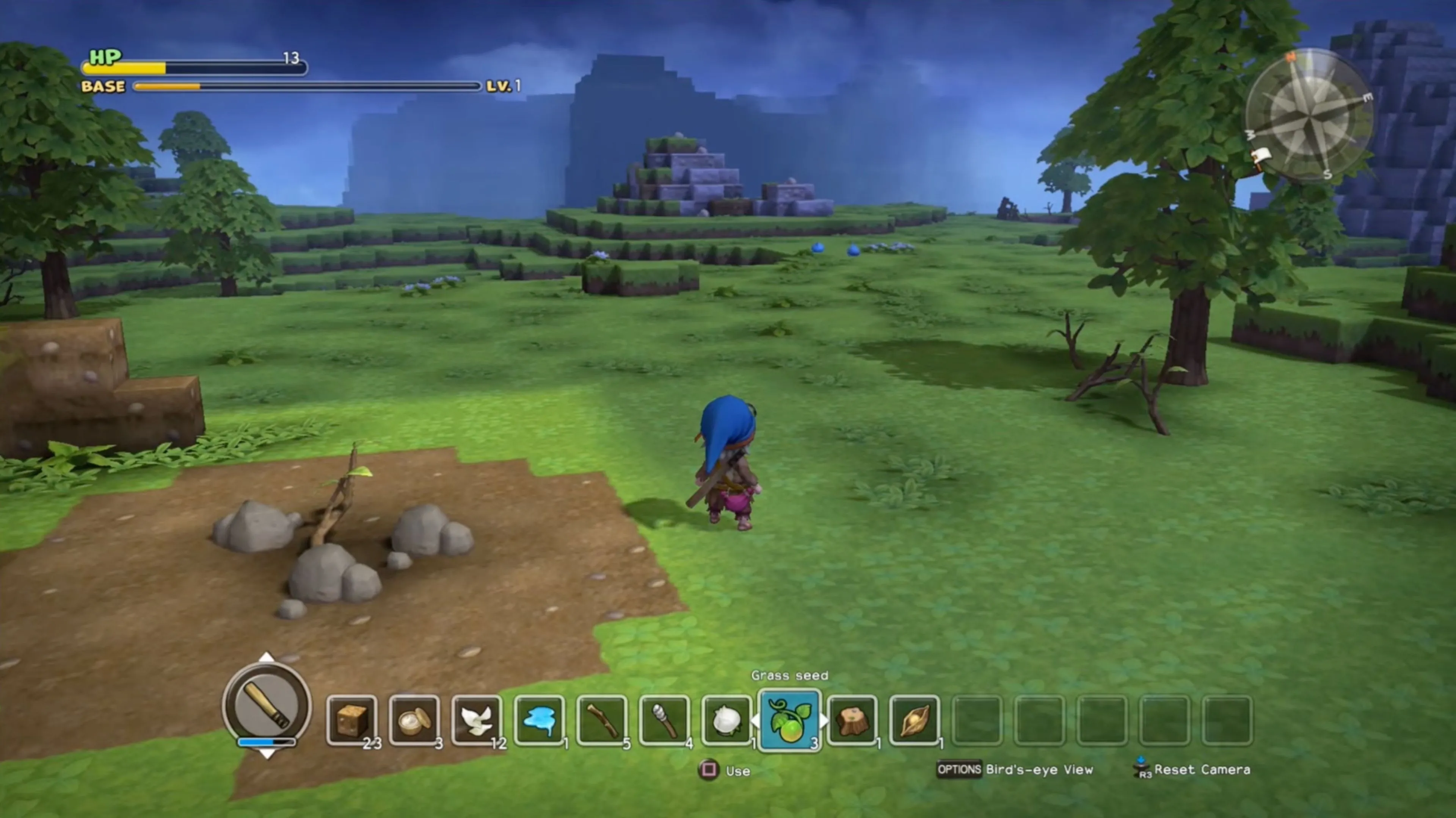 Ngôi làng Dragon Quest Builders nhìn từ trên cao, cho thấy sự phát triển và đa dạng của các công trình.