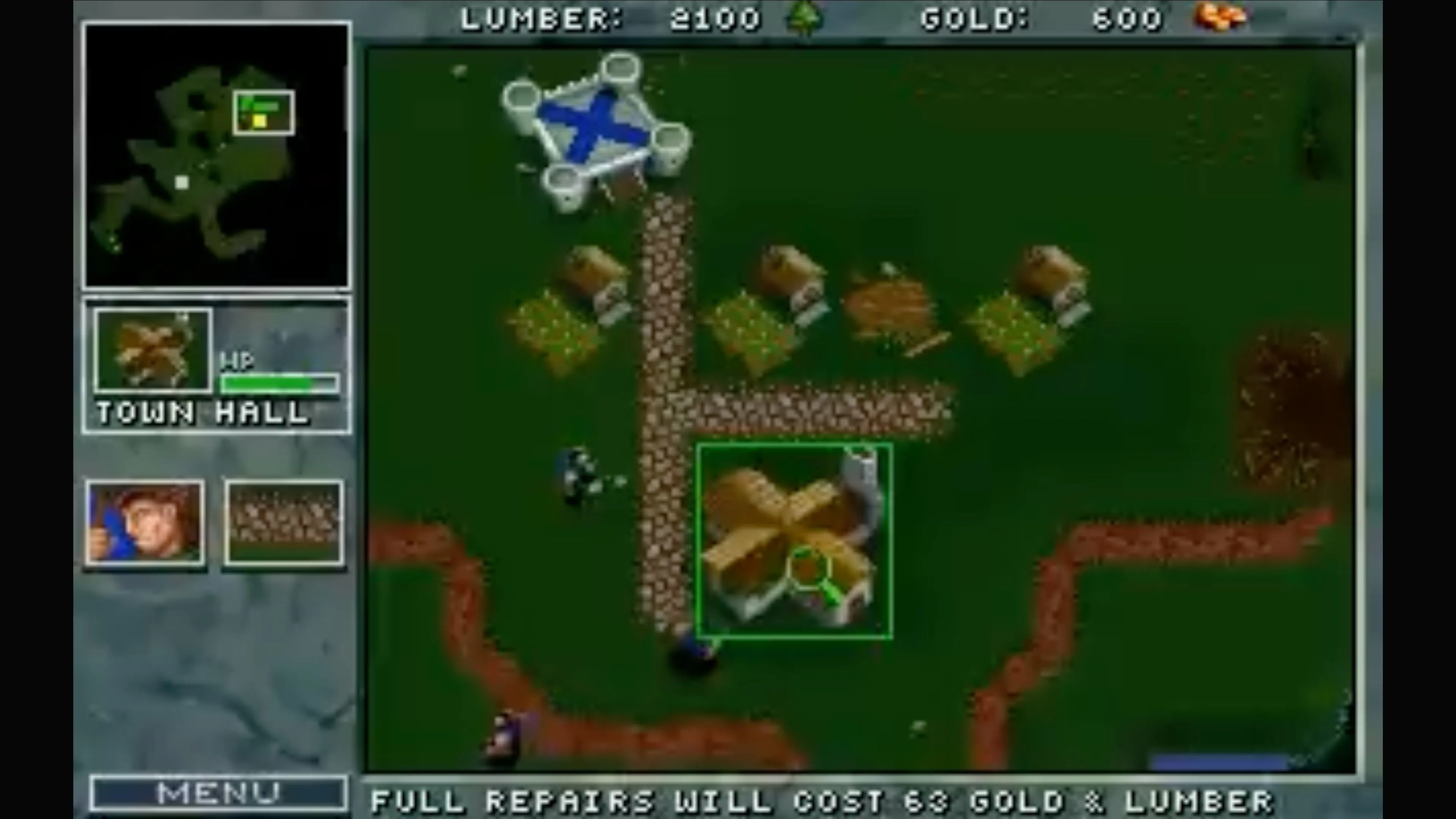 Quân đội Orc đang tấn công một căn cứ của loài người trong Warcraft: Orcs &amp; Humans, thể hiện động thái chiến thuật.