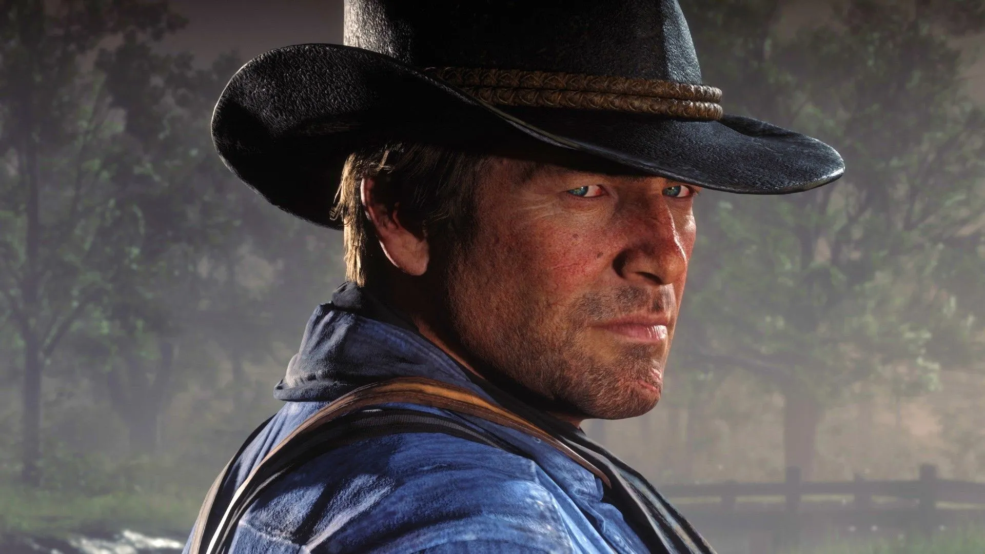 Arthur Morgan, với vẻ mặt trầm tư và ánh mắt chất chứa nỗi niềm, quay đầu nhìn lại trong ánh nắng chiều tà của Red Dead Redemption 2