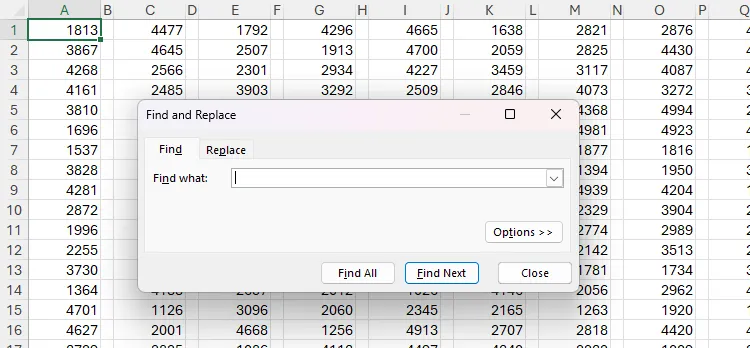 Bảng tính Excel chứa các số ngẫu nhiên, với hộp thoại Find And Replace được mở