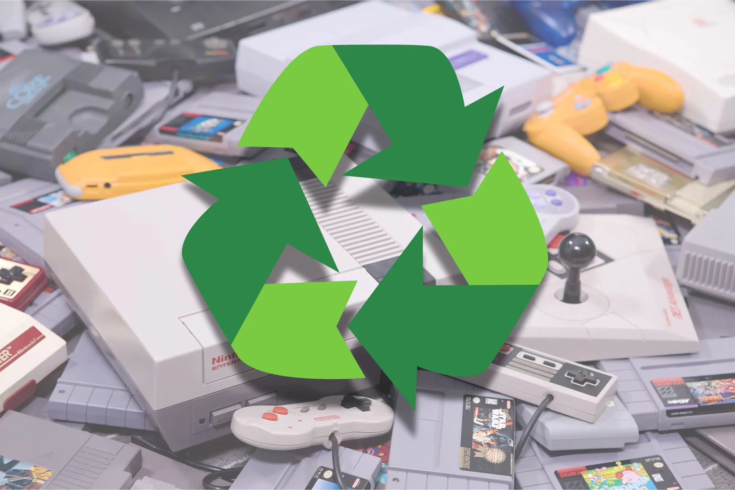 Biểu tượng tái chế trên một nhóm máy chơi game Nintendo cũ, thể hiện tầm quan trọng của việc xử lý thiết bị điện tử hết vòng đời.