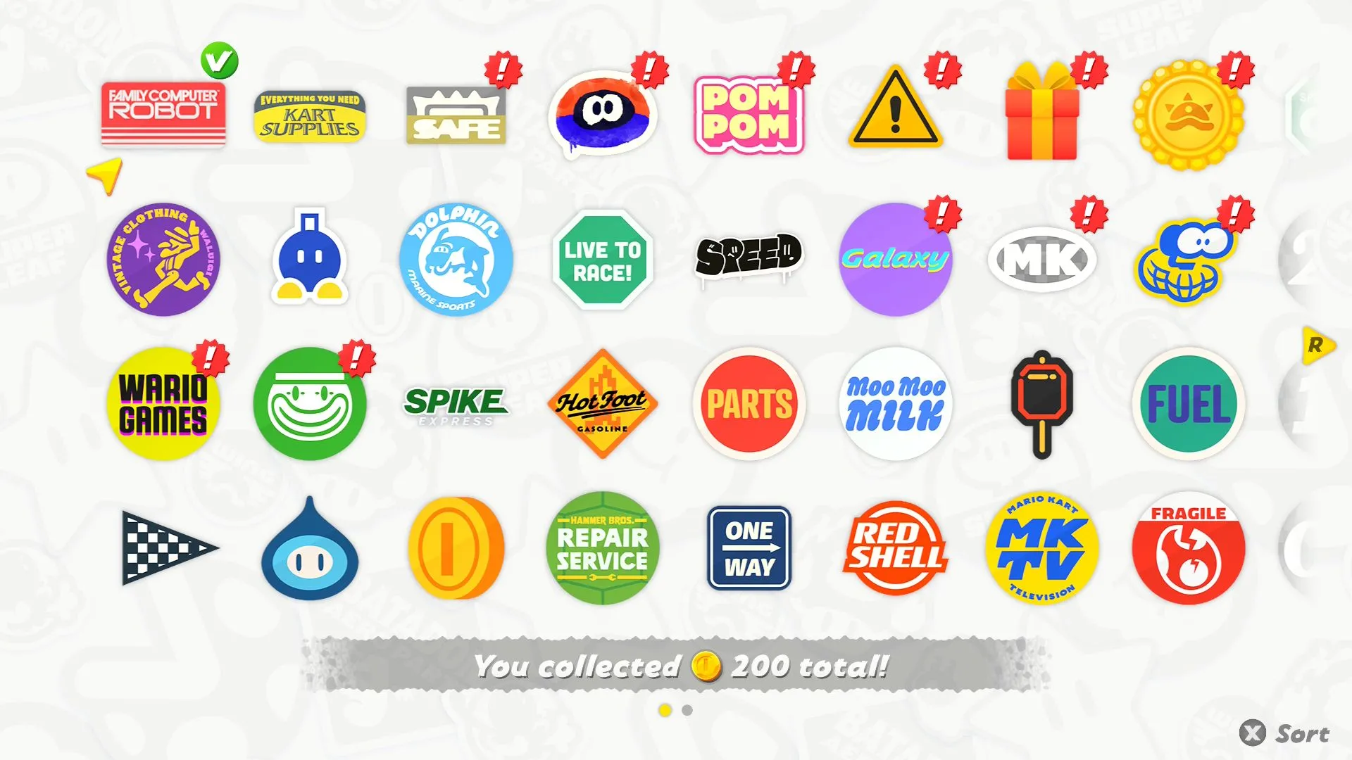 Bộ sưu tập nhãn dán trong Mario Kart World, minh chứng cho việc hoàn thành các thử thách