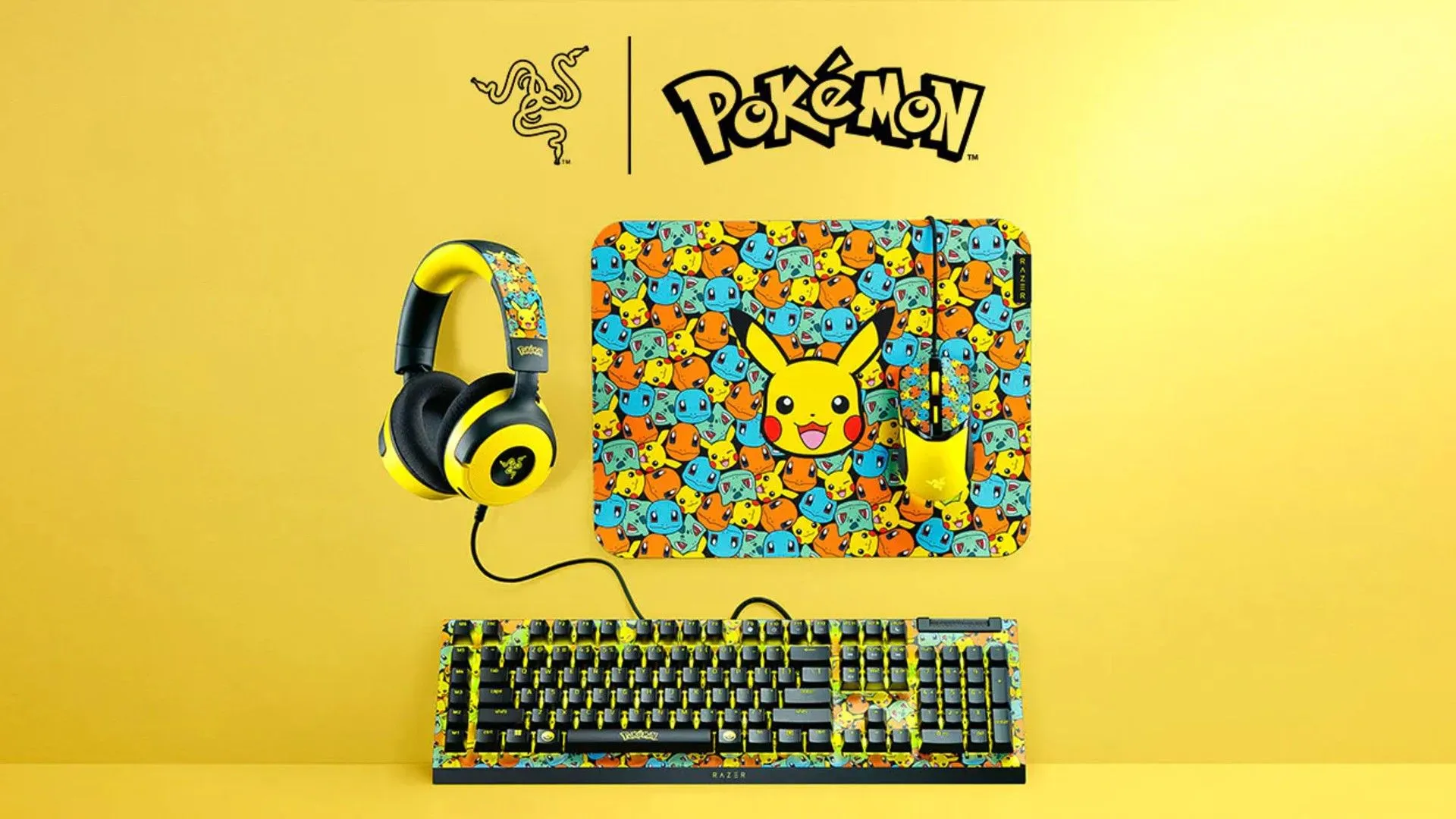Bộ sưu tập phụ kiện gaming Razer Pokémon bao gồm bàn phím cơ, chuột và lót chuột, trên nền vàng