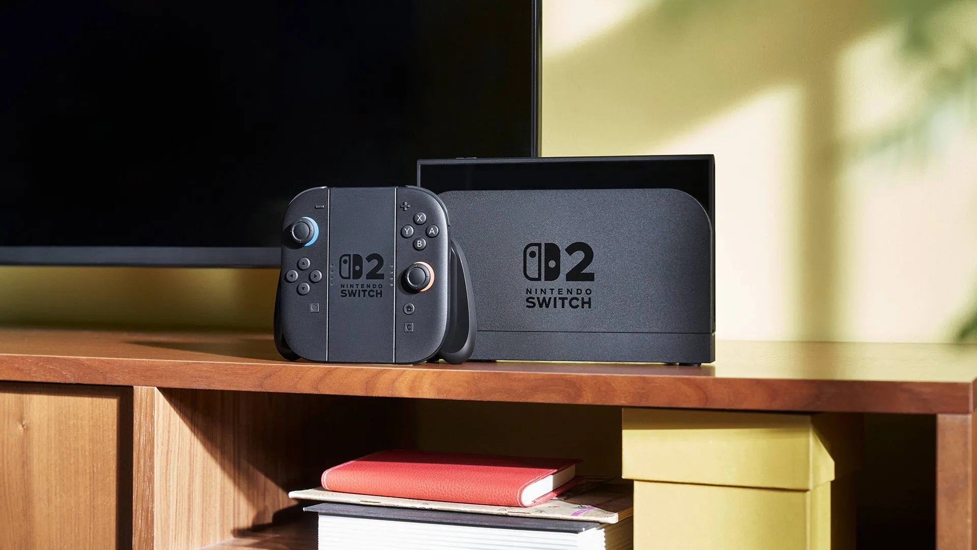 Console Nintendo Switch 2 với Joy-Cons gắn liền và đặt trong dock TV, minh họa cho cảnh báo cấm tài khoản