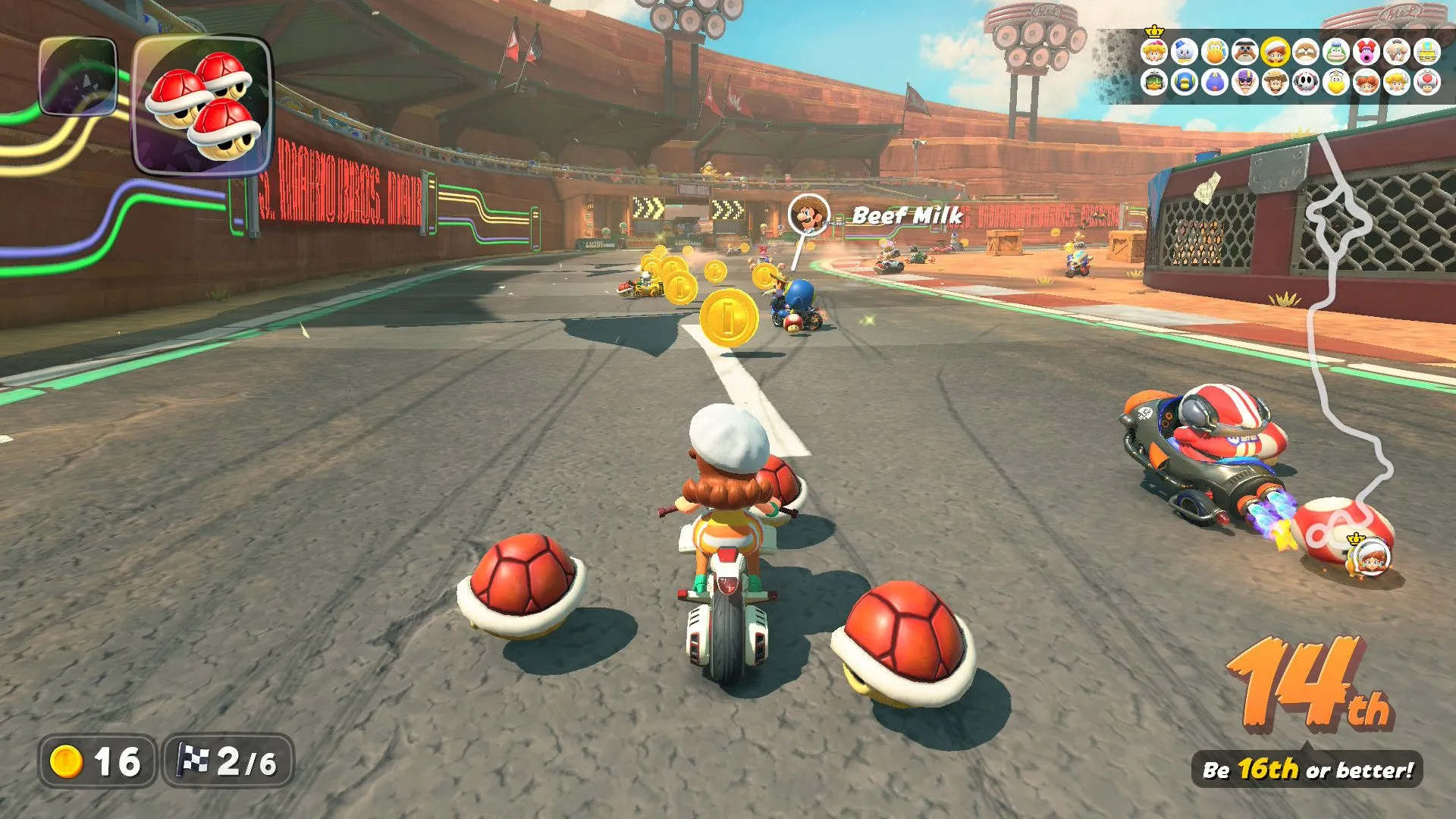 Daisy giữ ba quả Mai Rùa Đỏ trong Mario Kart World, sẵn sàng tấn công hoặc phòng thủ.