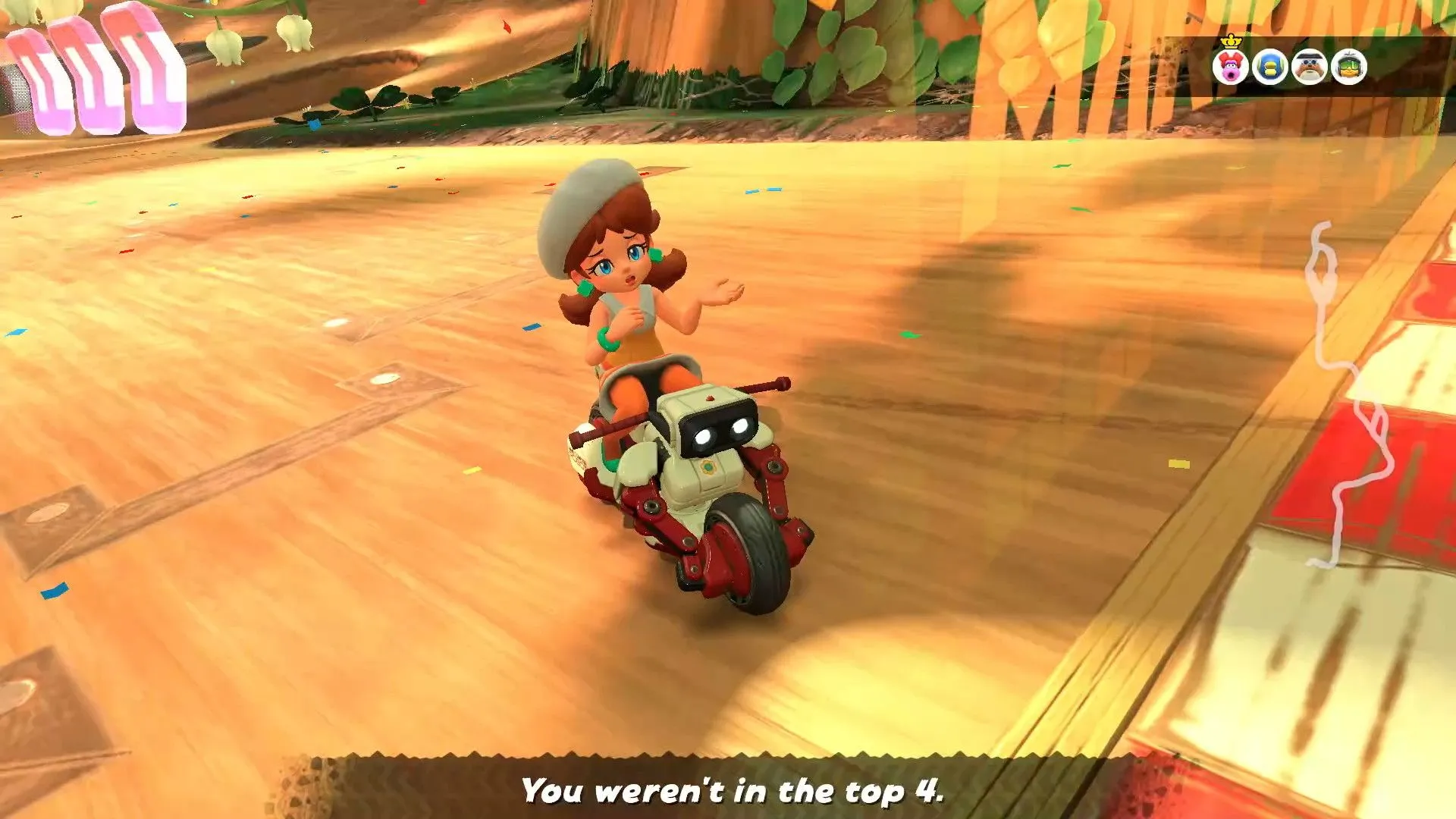 Daisy thất bại trong một vòng Knockout Tour của Mario Kart World, minh họa sự hỗn loạn của trò chơi.