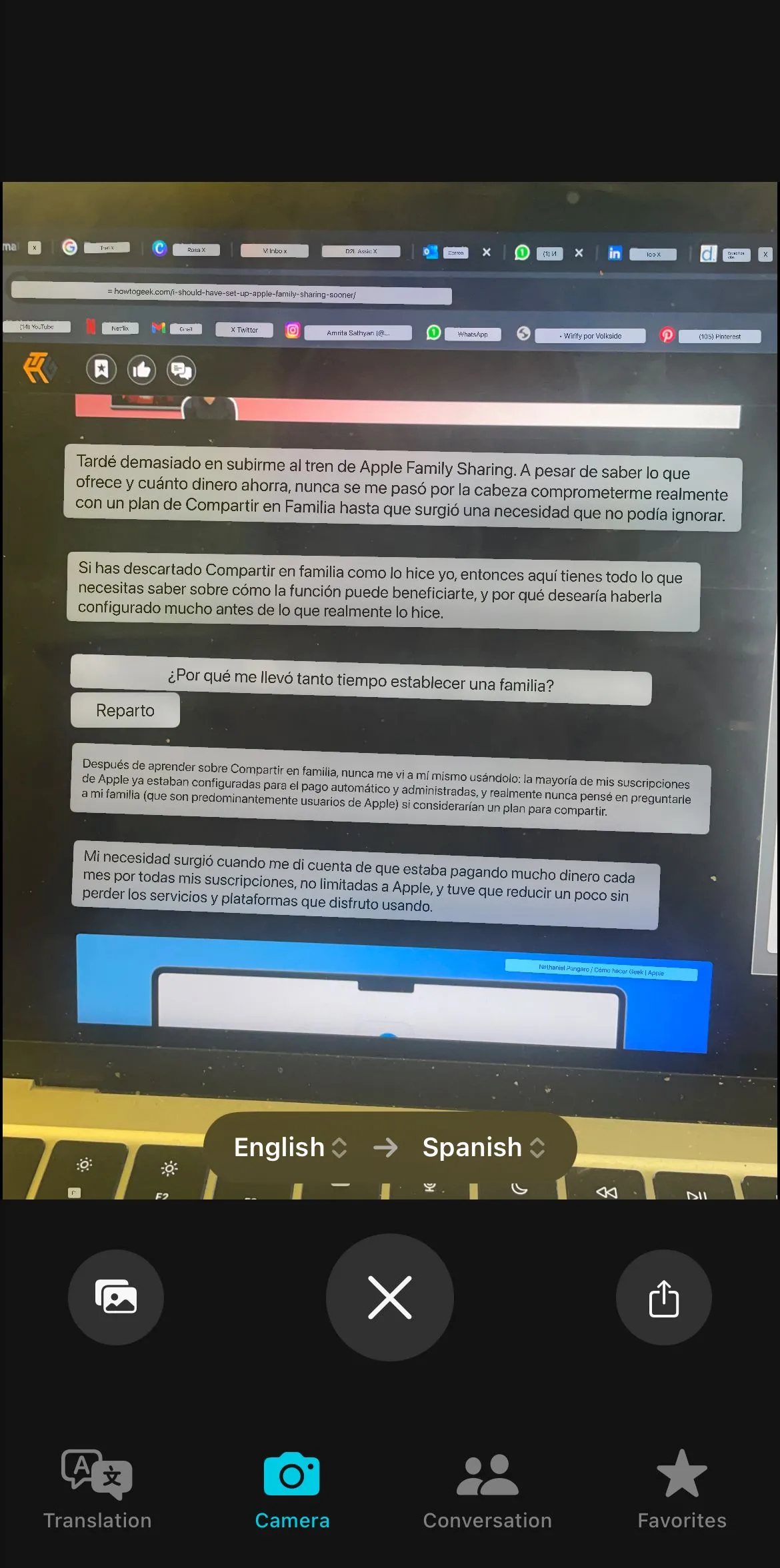 Dịch văn bản trên hình ảnh đã chụp bằng tính năng camera của Apple Translate, hiển thị bản dịch overlay.