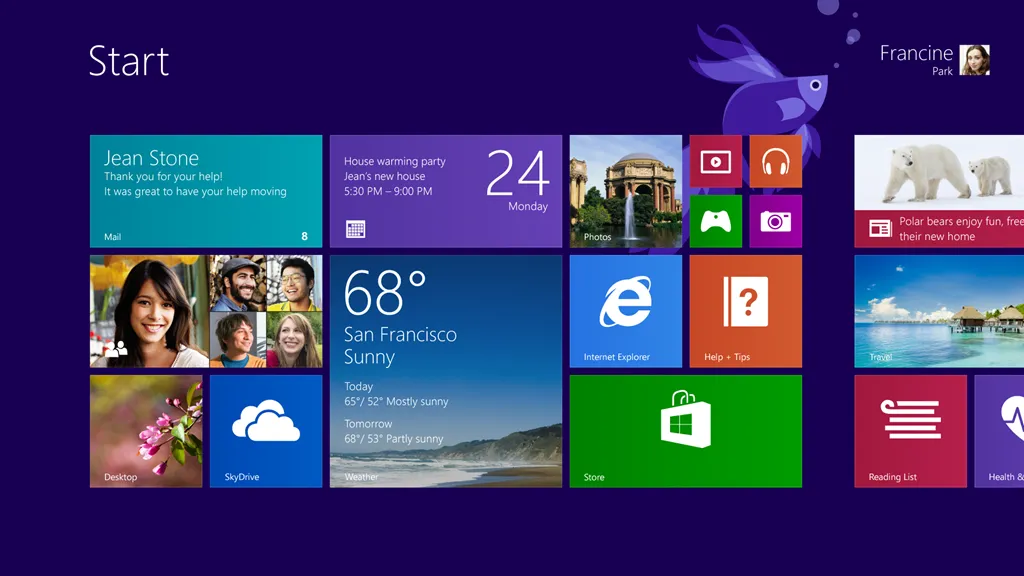 Giao diện màn hình Start của Windows với các ô ứng dụng đầy màu sắc, thông tin thời tiết và lịch