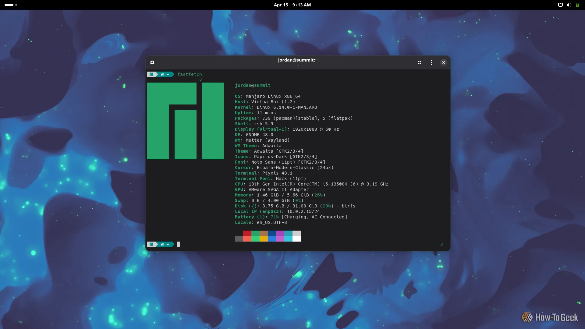 Màn hình desktop của Manjaro Summit với một cửa sổ terminal đang mở hiển thị thông tin hệ thống từ fastfetch, minh họa sự mạnh mẽ của bản phân phối Arch Linux thân thiện.