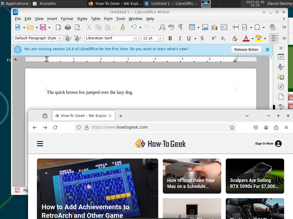 Màn hình desktop FreeBSD Xfce với các ứng dụng Firefox, LibreOffice Writer và Aisleriot solitaire đang chạy
