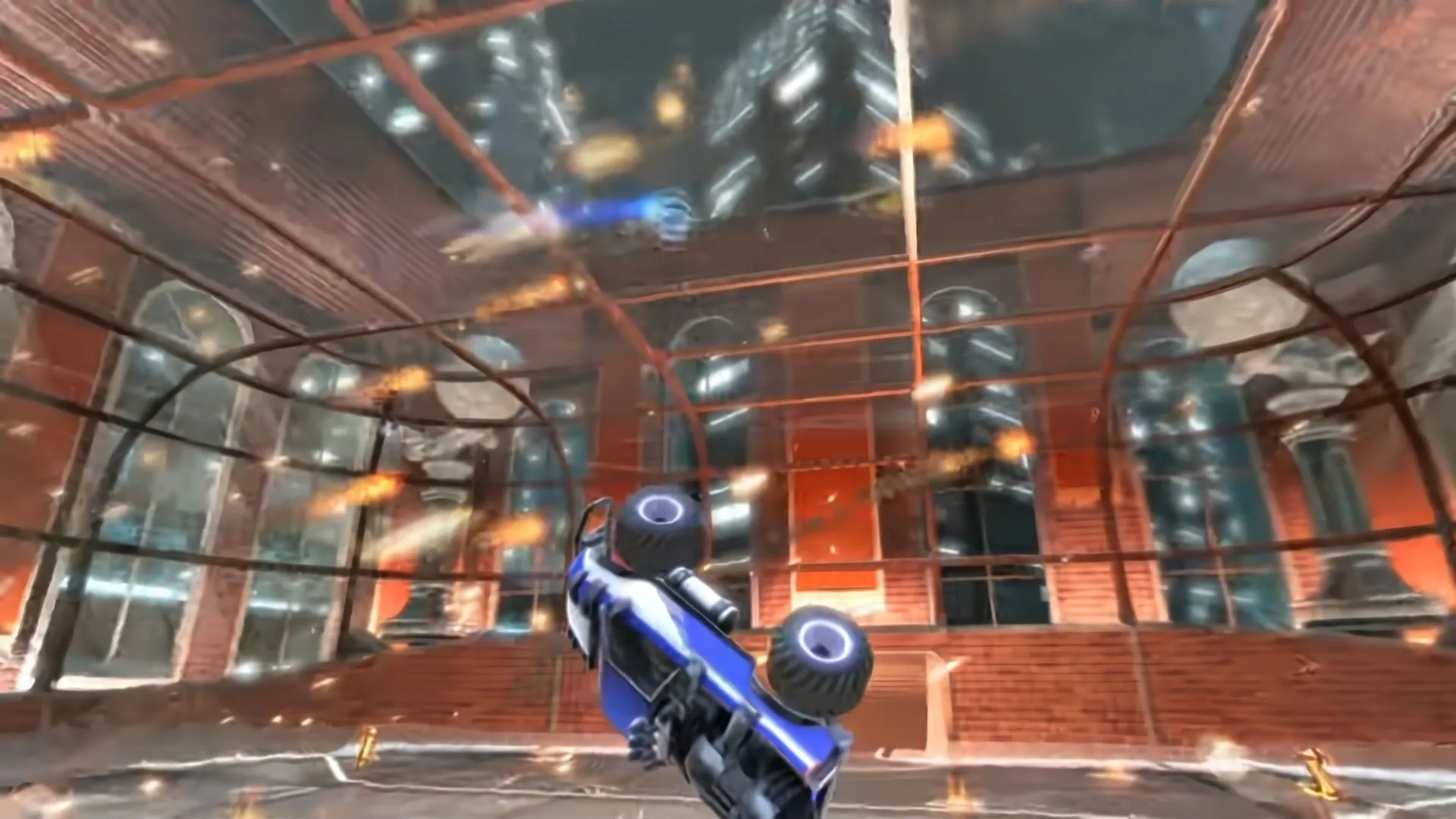 Một chiếc xe tải đang bay trên không trung khi lửa xoáy xung quanh trong Supersonic Acrobatic Rocket-Powered Battle-Cars.