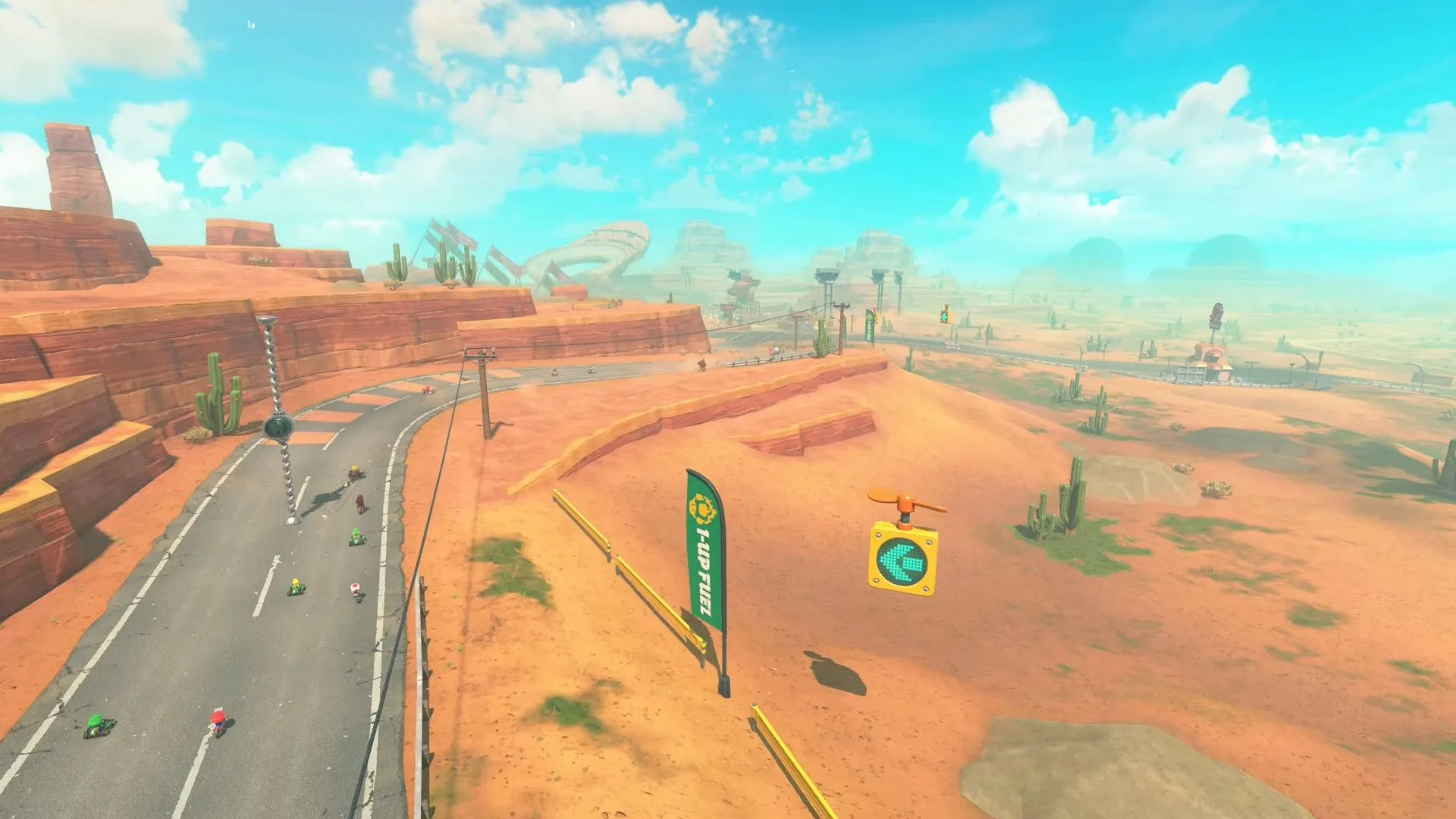 Một góc nhìn trên không đường đua sa mạc rộng lớn trong Mario Kart World