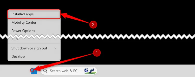 Menu chuột phải của Windows thông qua biểu tượng Windows trên thanh tác vụ được mở rộng và tùy chọn Ứng dụng đã cài đặt được chọn